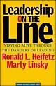 Leadership on the Line: Staying Alive Through the Dangers of Leading